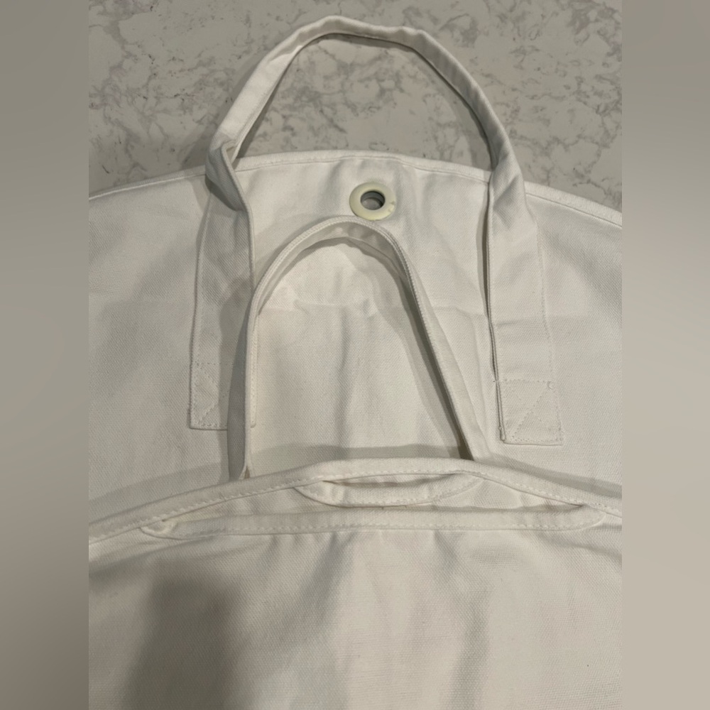 Brand new, without tags, authentic Christian Dior garment bags.